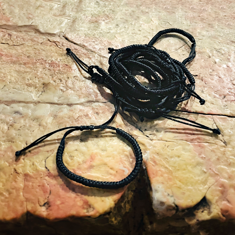 White bracelet with cross