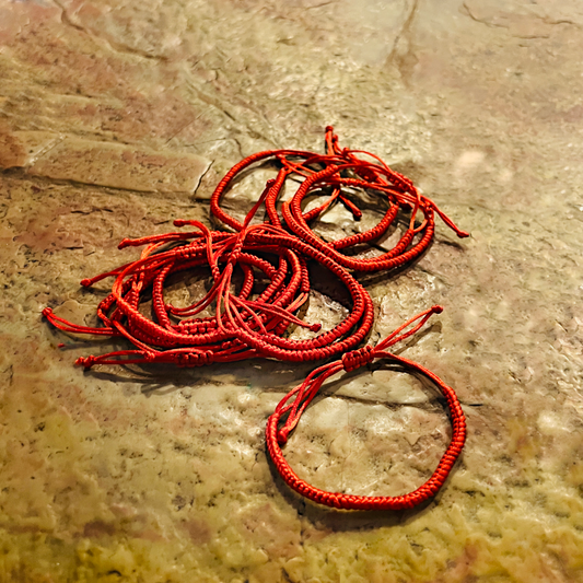 White bracelet with cross