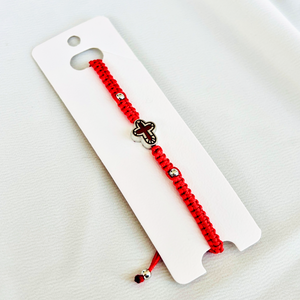 Red bracelet with a cross