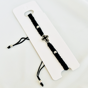 Black bracelet with a cross