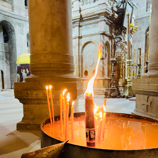 Light the Jerusalem torch in front of the Holy Sepulcher