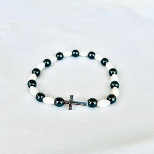 White bracelet with cross