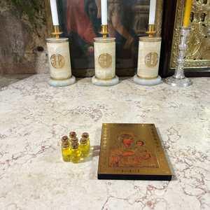 Oil from the lamps over the Tomb of the Virgin