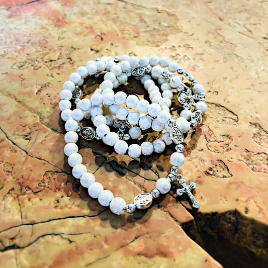 White bracelet with cross