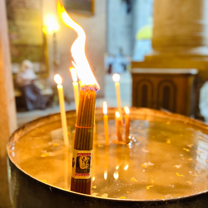 Light the Jerusalem torch in front of the Holy Sepulcher