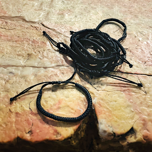 White bracelet with cross