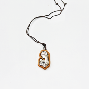 Olive pendant with the face of the Virgin