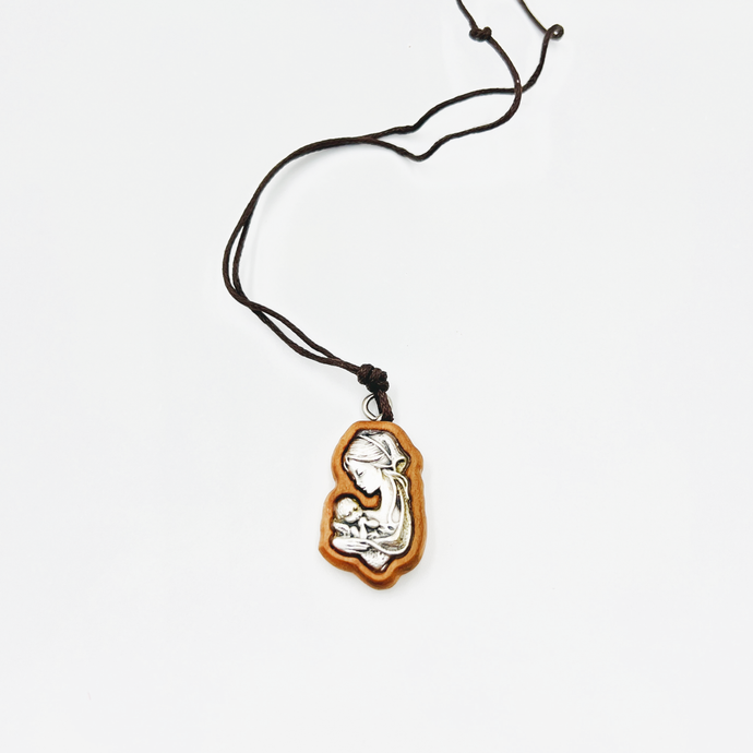 Olive pendant with the face of the Virgin