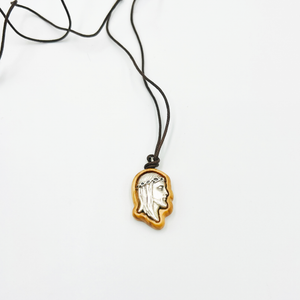 Olive pendant with face of Jesus Christ