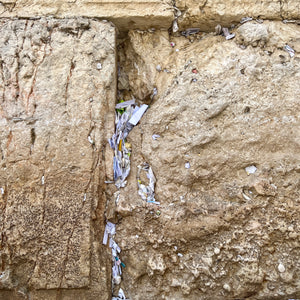 Write a note to the Wailing Wall